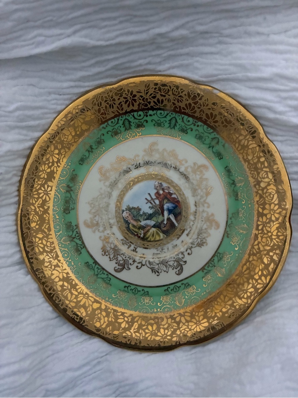 Decorative Green and Gold Porcelain Plate with Pastoral Scene